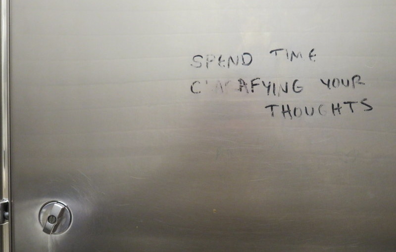 Instructive graffito in Powell’s bathroom