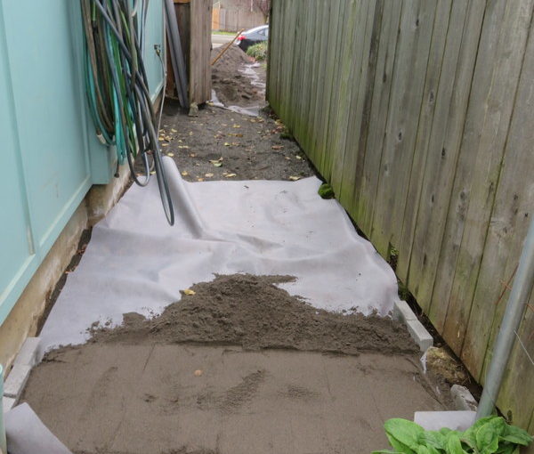 Side Yard Update: Spreading Sand.