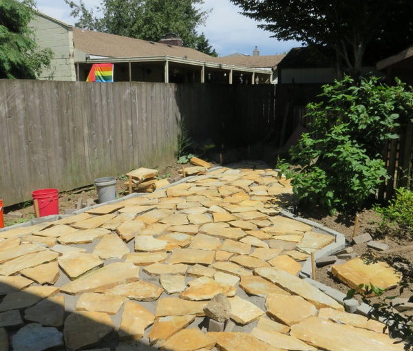 Backyard: 3 tons of flagstone, placed