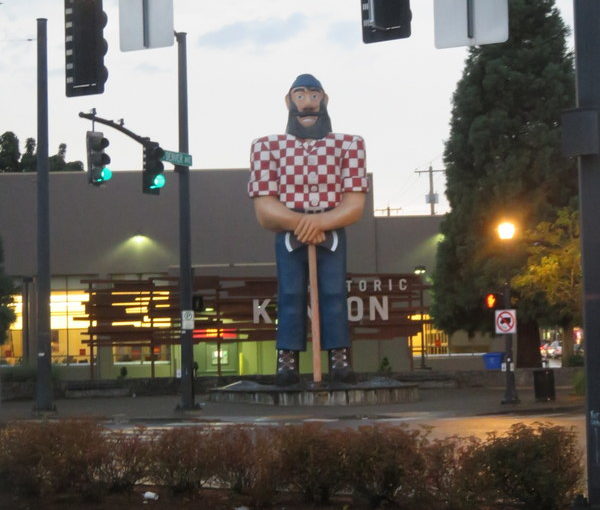 Paul Bunyan on a rainy evening, from a vantage point just outside the strip club.